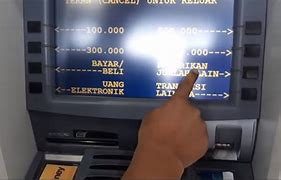 Ambil Uang Di Atm Mandiri Dengan Kartu Bsi